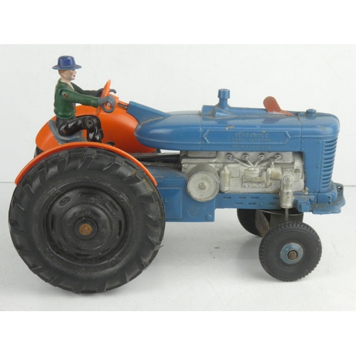 59 - A vintage Marx 'Tricky Tommy' battery powered tractor.