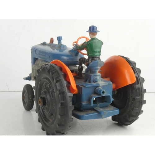 59 - A vintage Marx 'Tricky Tommy' battery powered tractor.