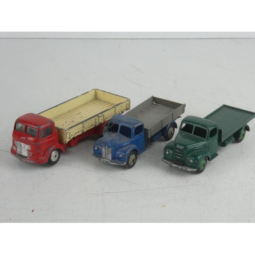 73 - A collection of 3 diecast Pick Up trucks, to include 2 by Dinky & a Corgi.