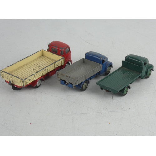 73 - A collection of 3 diecast Pick Up trucks, to include 2 by Dinky & a Corgi.