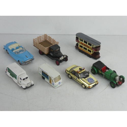 76 - A collection of 7 diecast vehicles to include Dinky, Papillon & more.