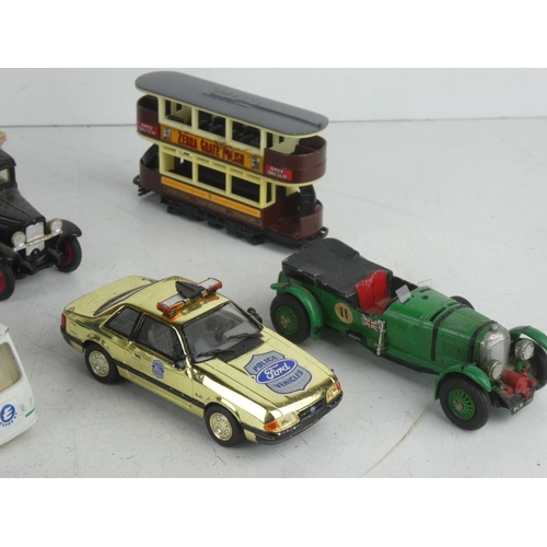 76 - A collection of 7 diecast vehicles to include Dinky, Papillon & more.