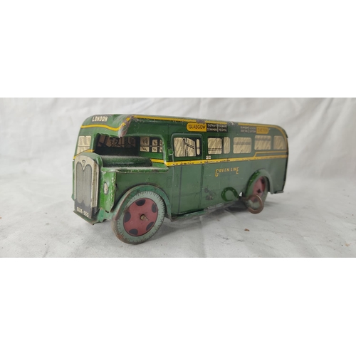 481 - A vintage Wells Brimtoy clockwork tin plate bus - GLX553 - Greenline Transport Bus.