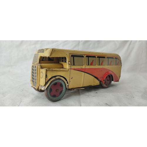 483 - A vintage Wells London clockwork tin plate bus - CLX553 - Private bus.