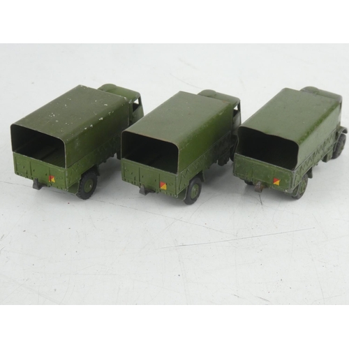 502 - 3 vintage Dinky Toys Army Wagons.