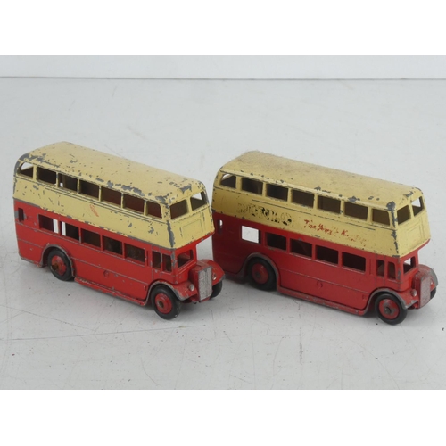 519 - Two vintage Dinky Toys double decker buses.