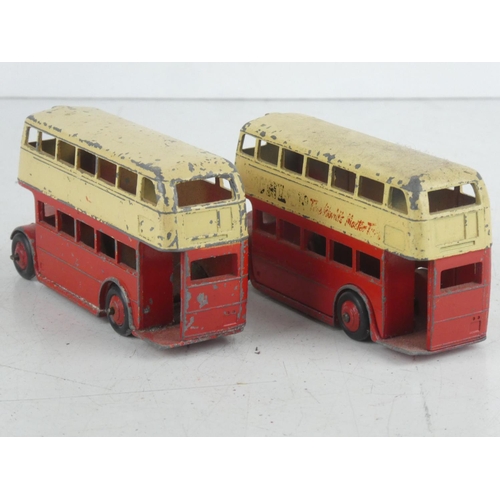 519 - Two vintage Dinky Toys double decker buses.