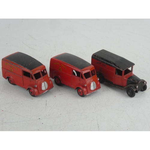 533 - Two Dinky Toys 260 Royal Mail vans and another.