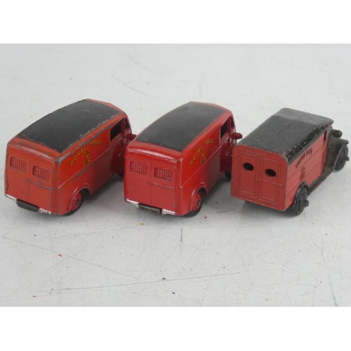 533 - Two Dinky Toys 260 Royal Mail vans and another.