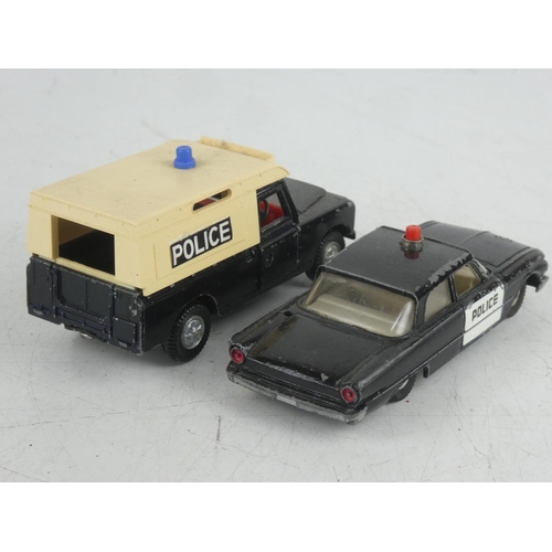 540 - A Dinky Toys 109 WB Police land rover and a Dinky Toys Ford Farilane police car.