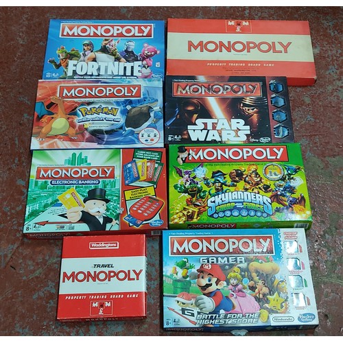 1 - An assortment of collectors Monopoly board games to include Star Wars, Pokemon, Super Mario & more.