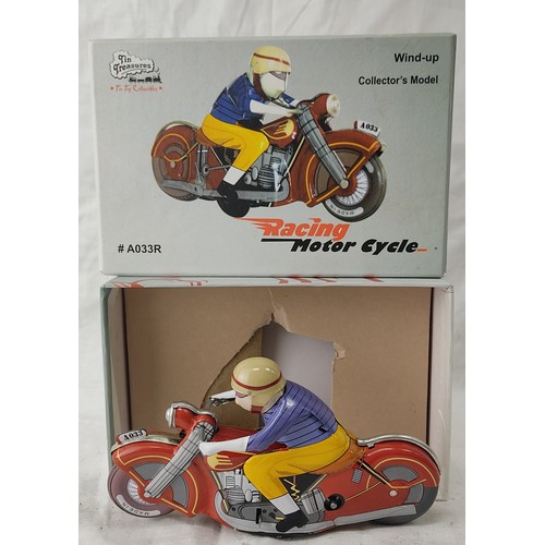 3 - A boxed 'Tin Treasures' racing motorcycle collectors model.