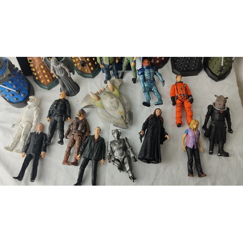 7 - A larger collection of Dr Who figures, to include Dr Who, Daleks & more.