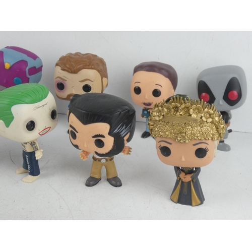 10 - A collection of 11 Funko Pops, to include Deadpool, Wolverine, Vision & more.