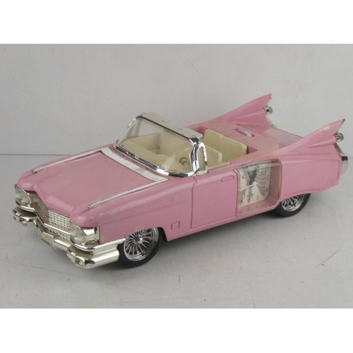 14 - A novelty 'Pink Lady' clock, modelled as a Cadillac car.