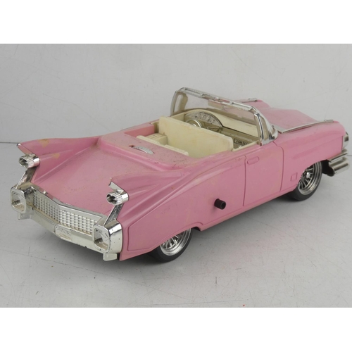 14 - A novelty 'Pink Lady' clock, modelled as a Cadillac car.