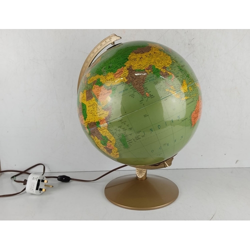 21 - A vintage illuminated globe.