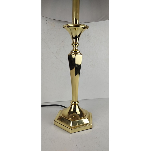 23 - A large decorative brass table lamp with shade.