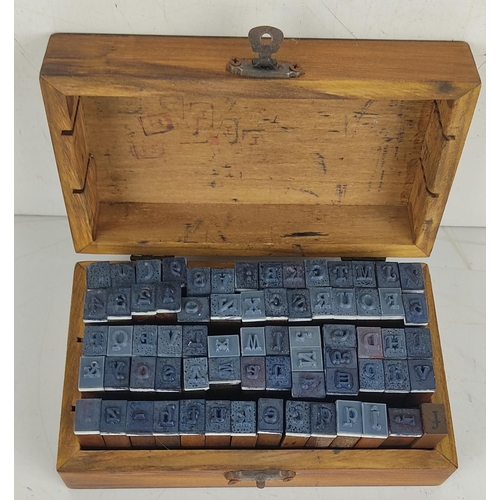 25 - A vintage alphabet stamp kit.