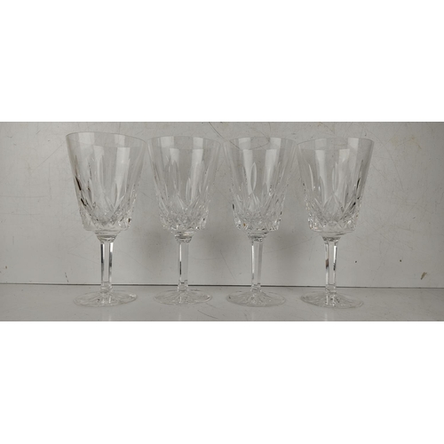 32 - A set of 4 Waterford Crystal (Seconds) Lismore pattern wine glasses. 21cm.