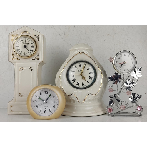 33 - A collection of 4 clocks to include Belleek & more.