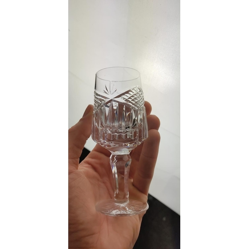 41 - A set of five and a set of six crystal glasses.