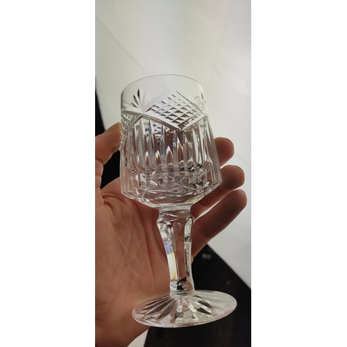 41 - A set of five and a set of six crystal glasses.