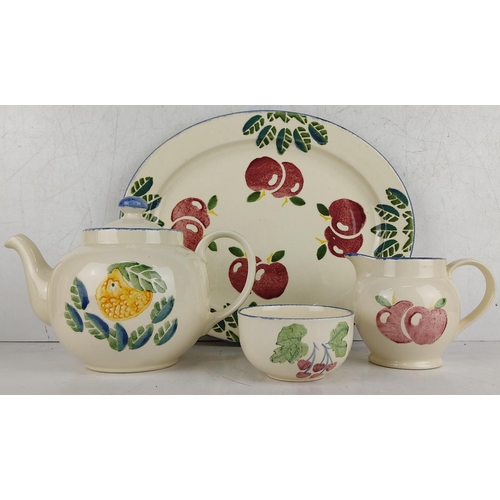 51 - A four piece hand painted Poole Pottery tea set.