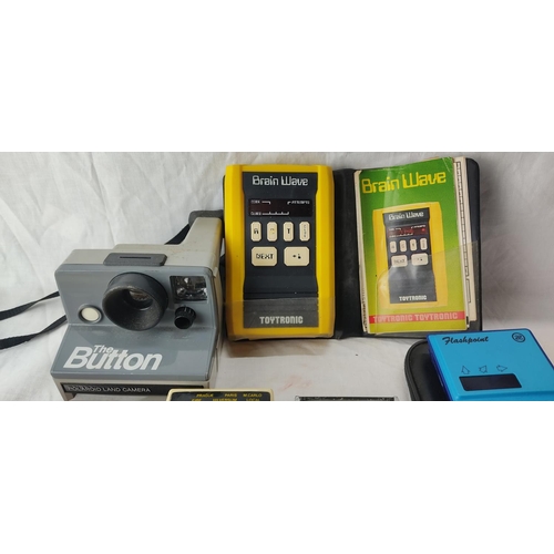 63 - A vintage ToyTronic brain wave game, a vintage The Button polaroid land camera and more.