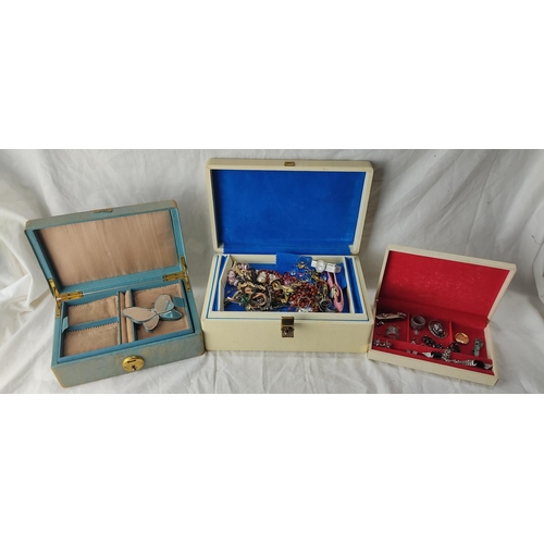 64 - Three vintage jewellery cases and contents.