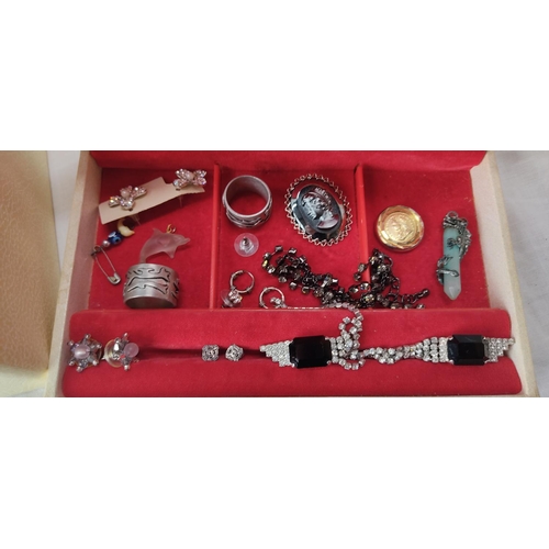 64 - Three vintage jewellery cases and contents.