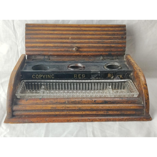 65 - A stunning antique oak inkwell set in the style of a rolltop desk.