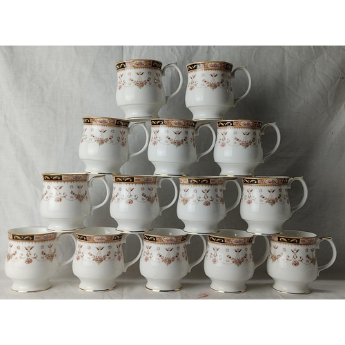 68 - 14 Queen's fine bone china mugs.