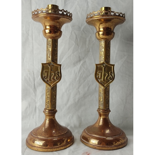 73 - A pair of vintage brass lacquered Alter candlesticks. 29cm