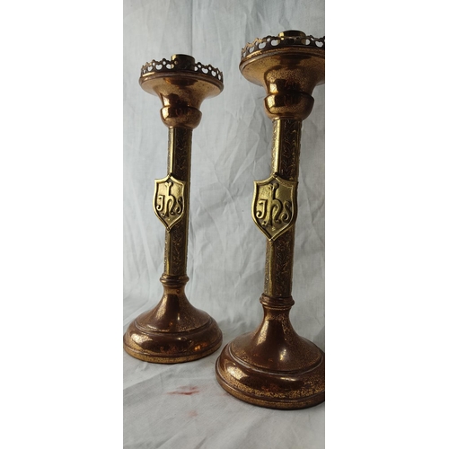 73 - A pair of vintage brass lacquered Alter candlesticks. 29cm