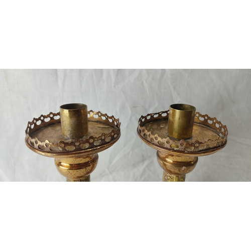 73 - A pair of vintage brass lacquered Alter candlesticks. 29cm