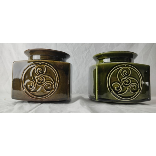 86 - A pair of Irish Ceramics & Crafts Co Ltd jars.