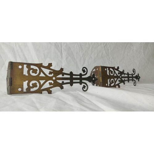 88 - A pair of large ornate hinges.