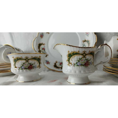 90 - A Queen's fine bone china tea set including cake plate, milk jug and sugar bowl.