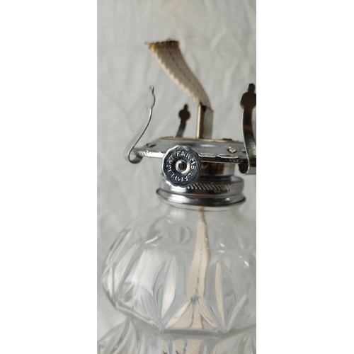 97 - A vintage clear glass oil lamp.