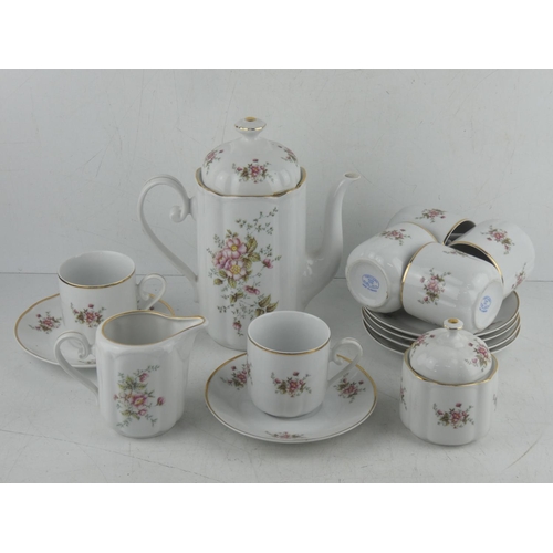 114 - A Romanian floral patterned tea set.