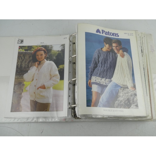 115 - A vintage folder of knitting patterns.