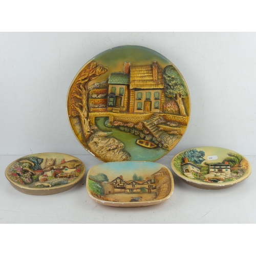 116 - A lot of vintage clay pottery plaques.