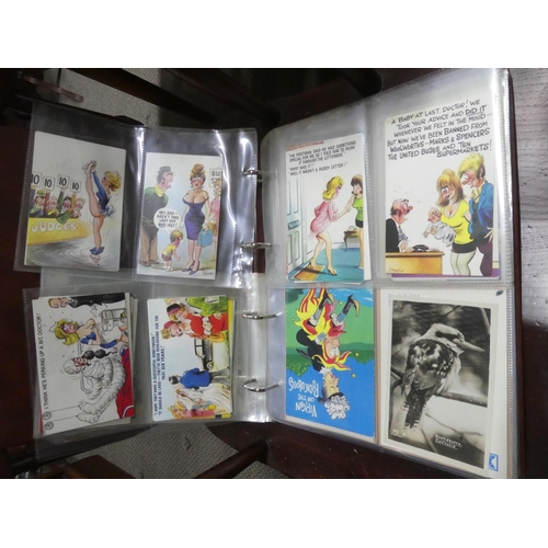 214 - A folder containing assortment of vintage postcards.