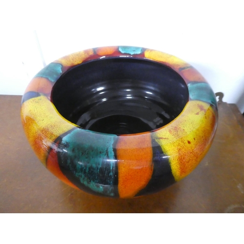 223 - A large vintage Poole Pottery fruit bowl. 23cm diameter. 12cm in height