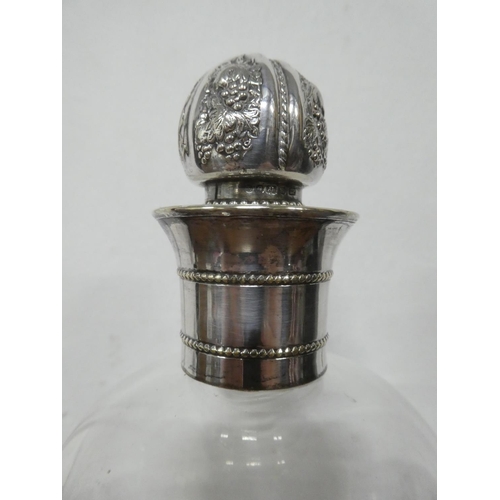 225 - A stunning antique decanter with sterling silver collar & stopper.