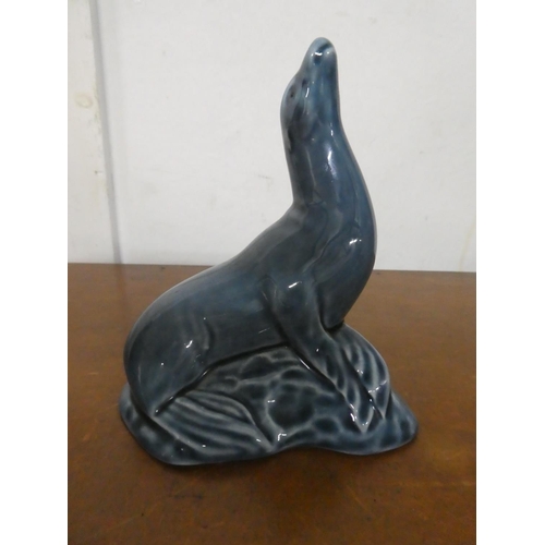 231 - A vintage Poole Pottery seal.