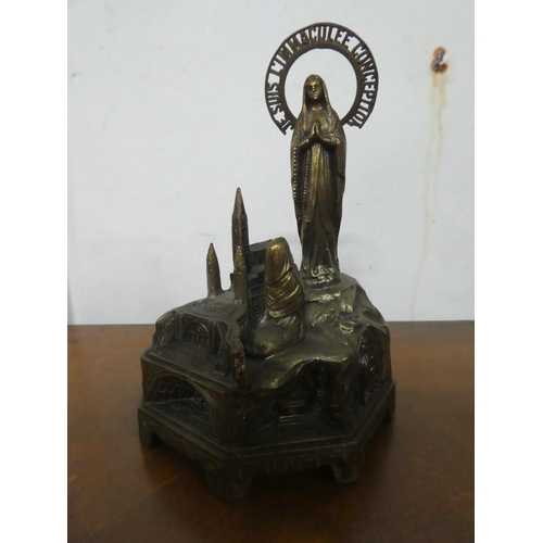 232 - A vintage Musical 'Lady of Lourdes' souvenir.