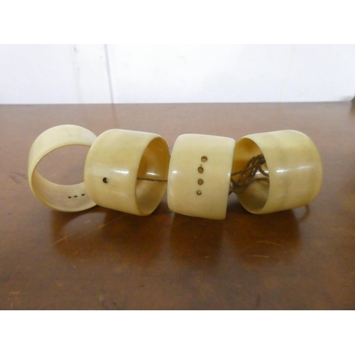 237 - A set of 4 vintage/ antique celluloid napkin rings.