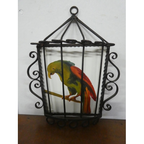 238 - A vintage ceramic Parrot tile in metal cage.